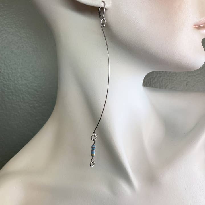 RESIST || Pendulum1 Earrings for wholesale by Wired Resistance