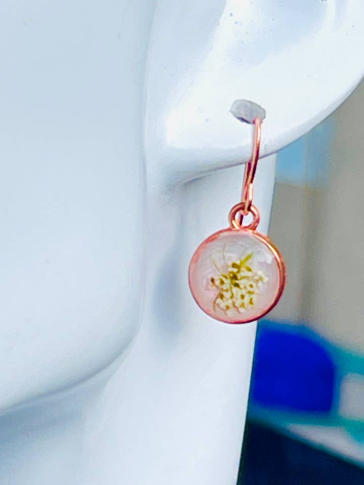 Hand dried Queen Ann Lace flowers in resin w/rose gold for wholesale by Handmade clay and resin Jewelry