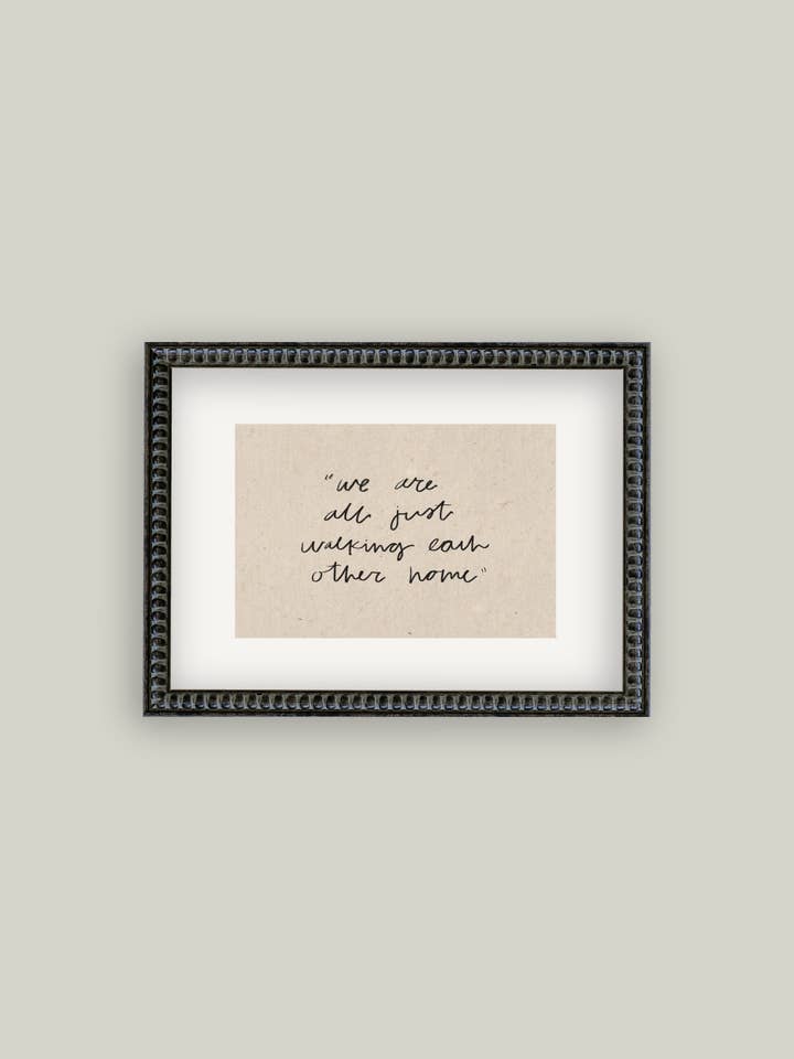 Lámina antigua enmarcada con texto «We Are All Just Walking» para venta al por mayor de Petal Lane Home