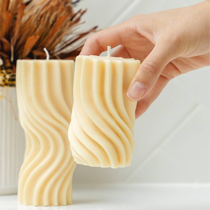 Remi Wavy Pillar Candle Medium for wholesale by Iconic Candles