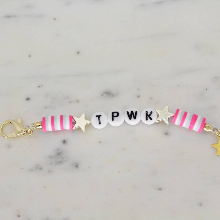 TPWK Keychain for wholesale by White Daisy Jewelry LLC