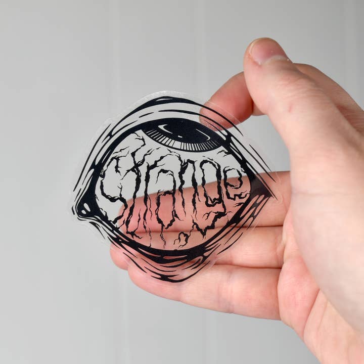 Strange Gloss Transparent Vinyl Sticker for wholesale by Lofty Dog Designs