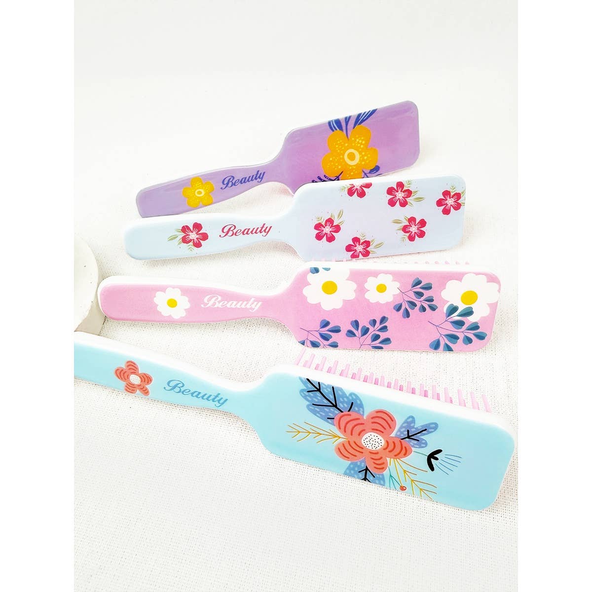 MÉLANGER LA COULEUR Brosse à cheveux rectangulaire à imprimé floral frais en vente sur Faire3