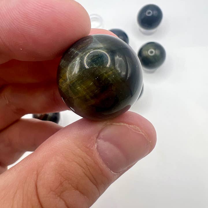 Oils and Auras - Wholesale Spiritual Stone/Crystal - Mini Hawkeye Sphere3
