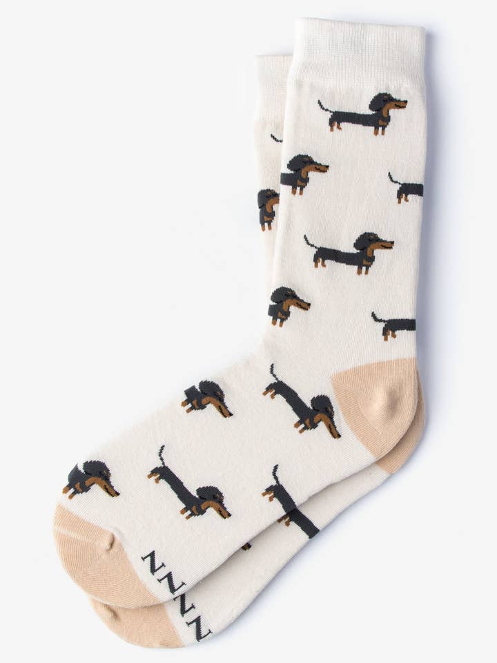 cream carded cotton A Little Weenie - Weiner dog Dachshund Sock by Alynn for wholesale on Faire