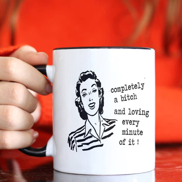 Funny coffee mug - Completely a bitch and loving it for wholesale by Cleverish Co