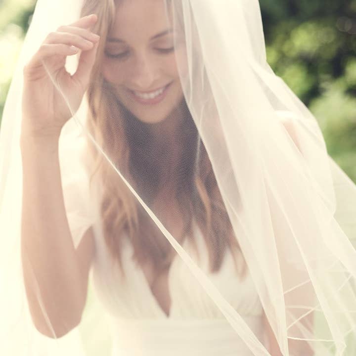 Ivory 2 Layer Pencil Edge Veil for wholesale on Faire