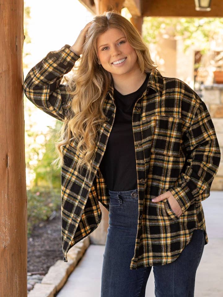 KARIERTE JACKE MIT FRANSEN für den Großhandel von DESHENG ENTERPRISE