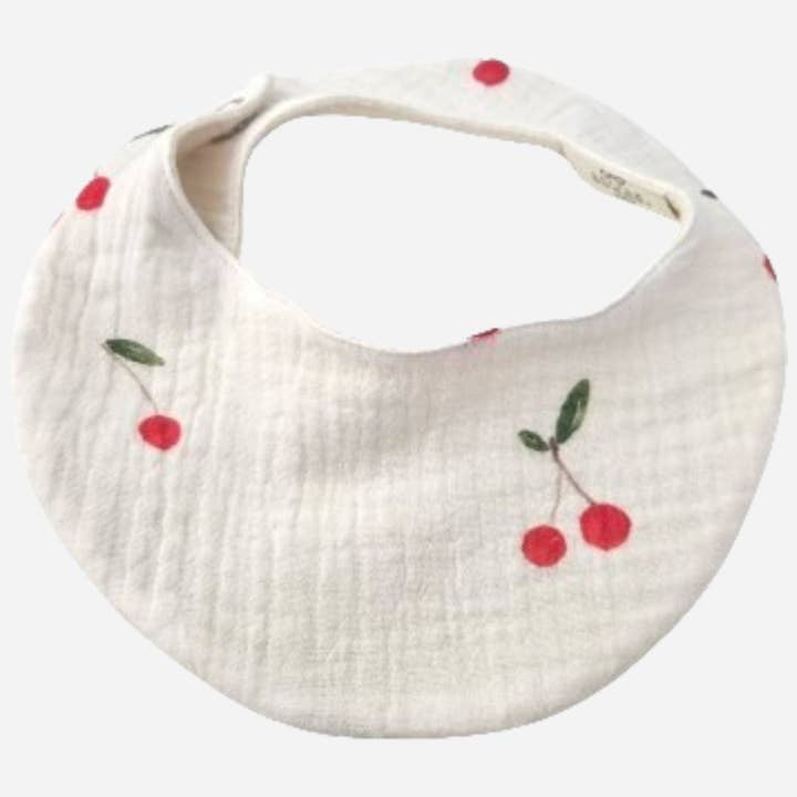 Bavoir imperméable Cerises pour la vente par Little Scandi baby