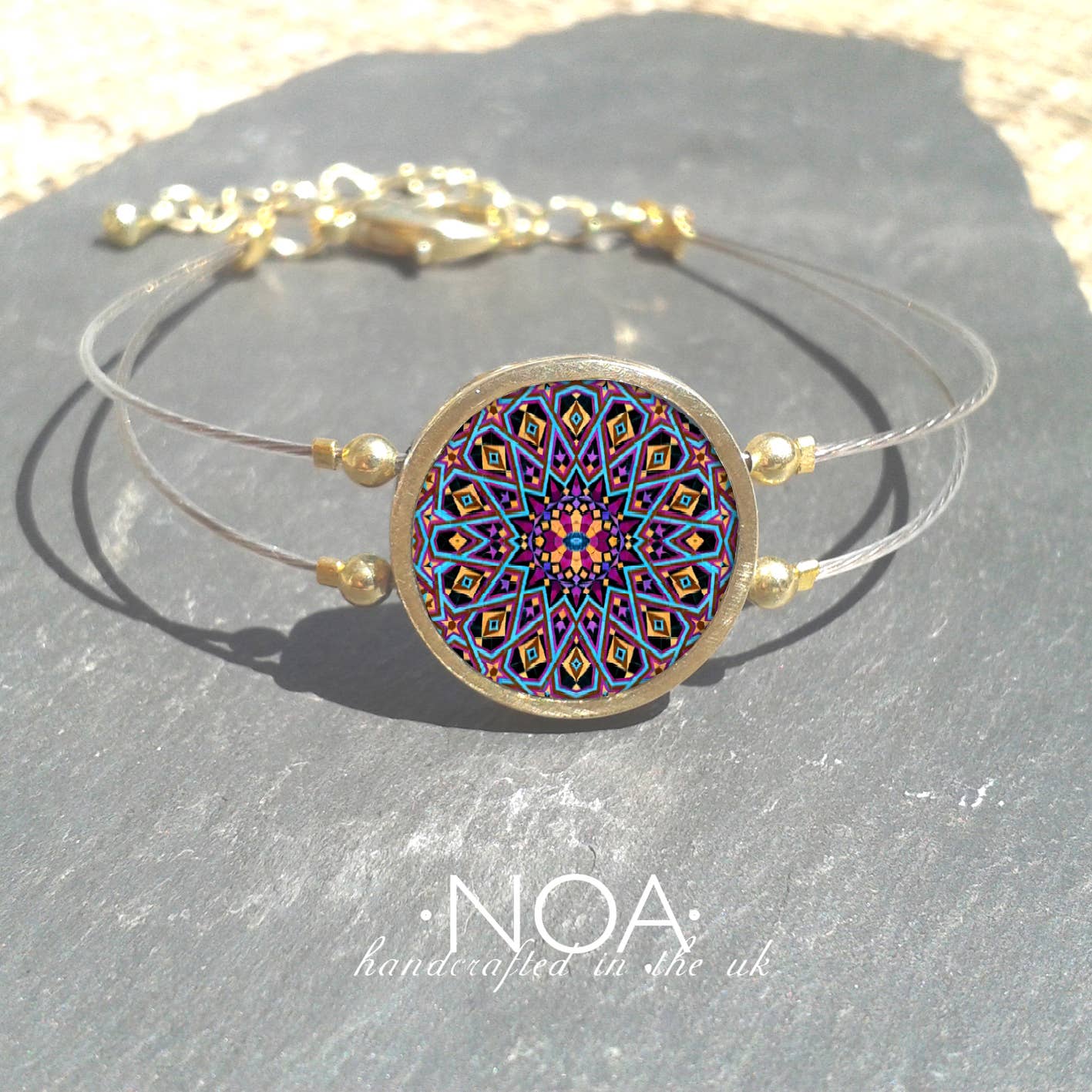 Noa Jewellery – wholesale Charm/dangle bracelet – Round Ceramic Bracelet, Gold Plated Stainless Steel Frame16