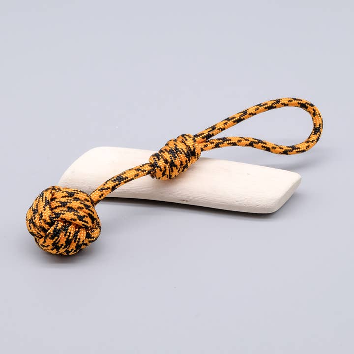 Llavero Paracord «Monkey Fist» naranja y negro para venta al por mayor de La Fabrique du Noeud