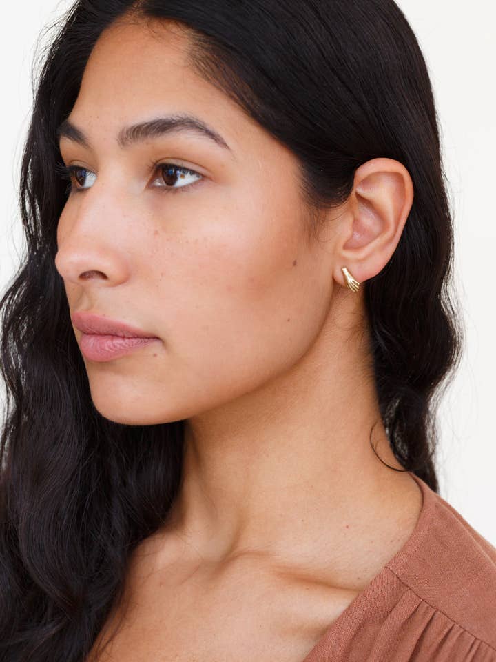 Give and Receive Hand Studs for wholesale by Moon + Arrow