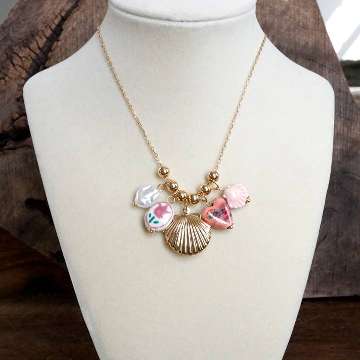 Multi-Charm Chinoiserie & Shell Locket Necklace – Pink & Gold for wholesale by PennyLine inc