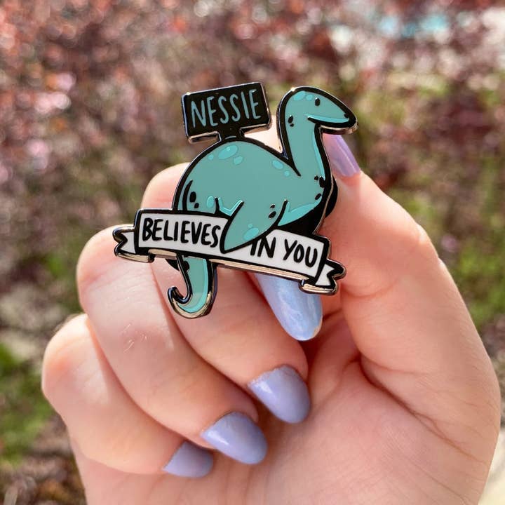 Nessie Motivational Cryptids Hard Enamel Pin for wholesale by rosefinchie