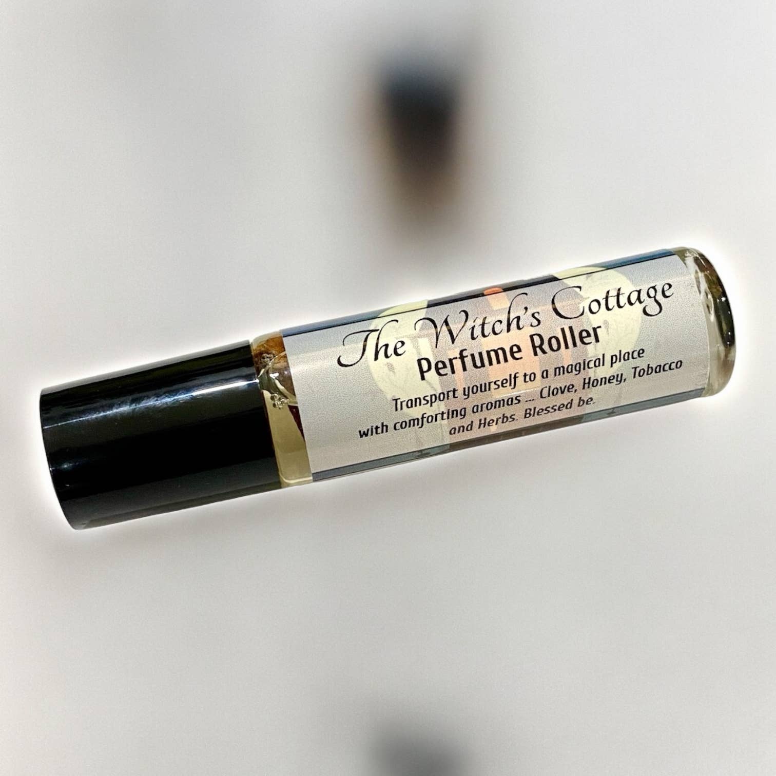 Raven’s Hearth – Engroshandel Roll-on duft – Heksens Hytte Parfumerulle | Honning, nelliker & tobak1