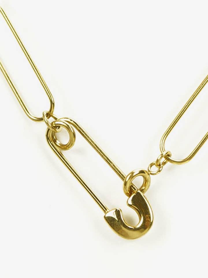 Collier amovible en acier inoxydable avec finition dorée pour la vente par Victoria Moda