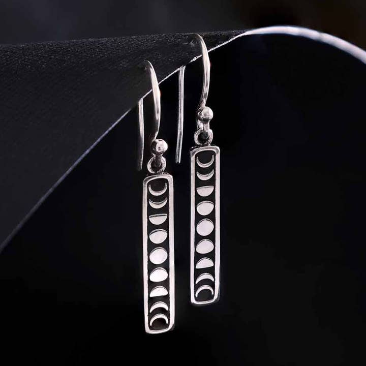 Sterling Silver Vertical Moon Phase Dangle Earrings 36x4mm for wholesale by Nina Designs