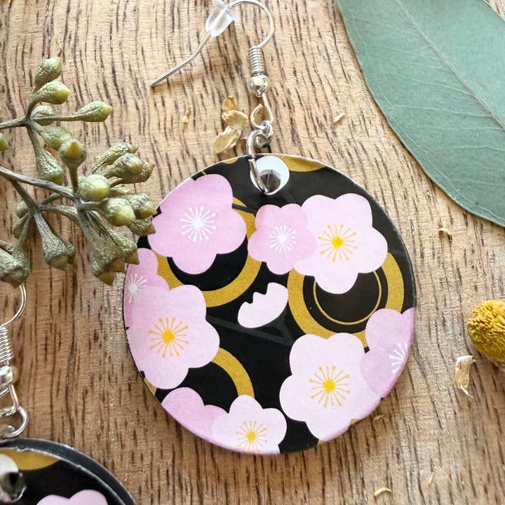 Wood Disc Drop Earrings – Pink & Black Floral for wholesale by Pin Up Cosmetics