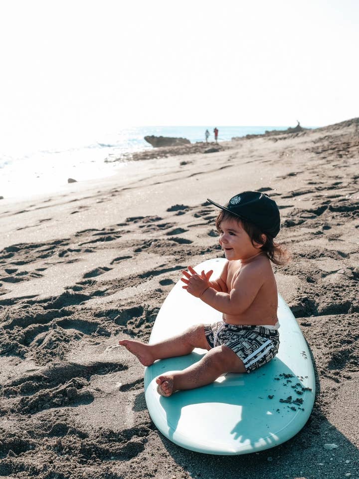 The Little Surfer Dude - Wholesale Swim Shorts - Kids - Vintage Black Swell Swim Trunks3