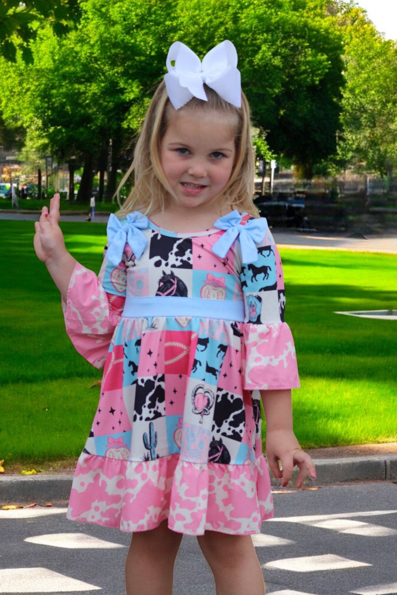 Kids Charm Online - Wholesale Dress - Kids - Beautiful wester patch printed girls dress with bows and cow printed hem.7
