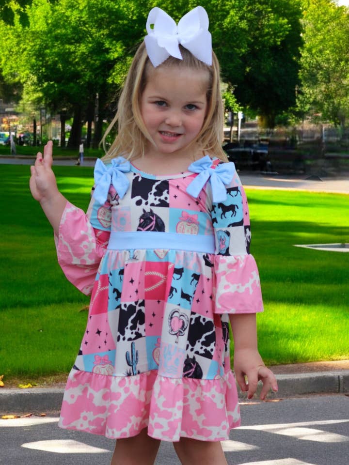 Kids Charm Online - Wholesale Dress - Kids - Beautiful wester patch printed girls dress with bows and cow printed hem.7