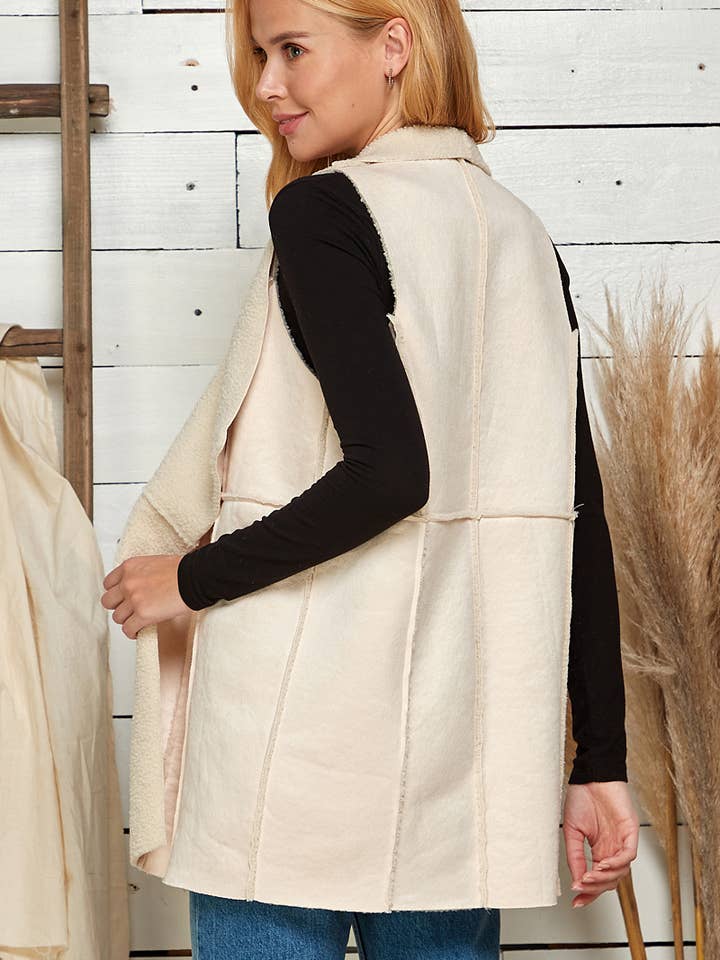 IVORY BOUCLE MUSTANG DRAPED COLLAR VEST for wholesale on Faire