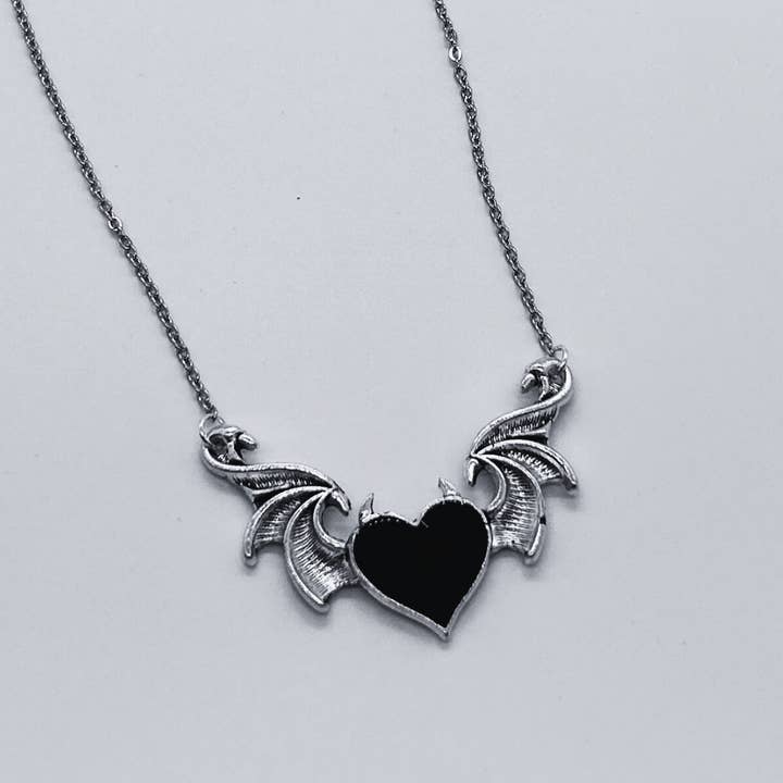 Silver Winged Heart Charm Necklace for wholesale by ARTEMIS