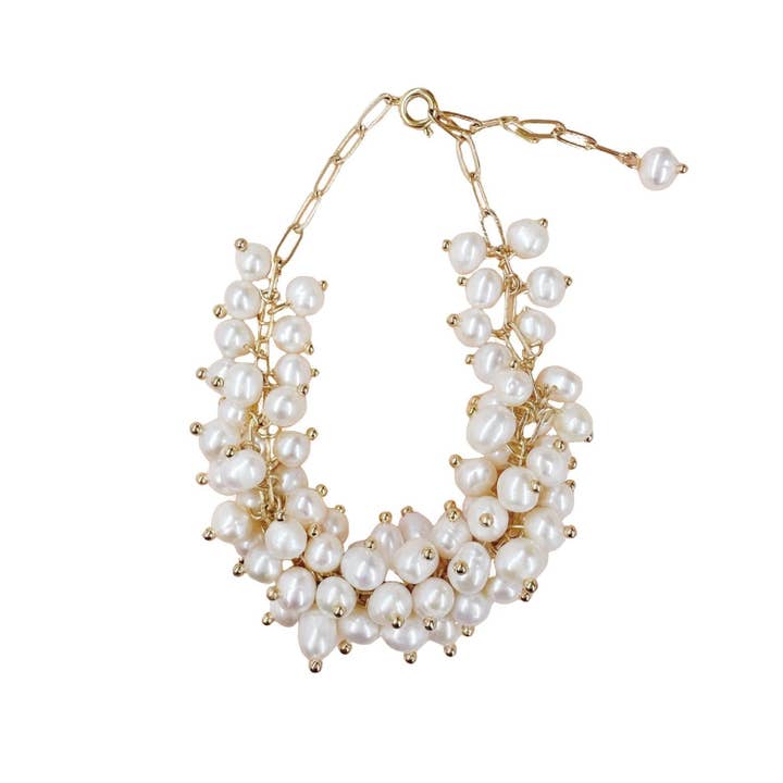 Armband med elfenbensfärgade pärlor i olika storlekar för wholesale av Angel Barocco