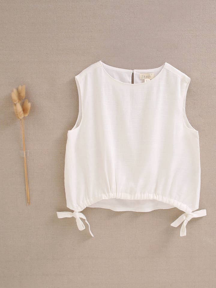 Blusa bianca per bambina con coulisse regolabile per la vendita all'ingrosso da parte di Dadati
