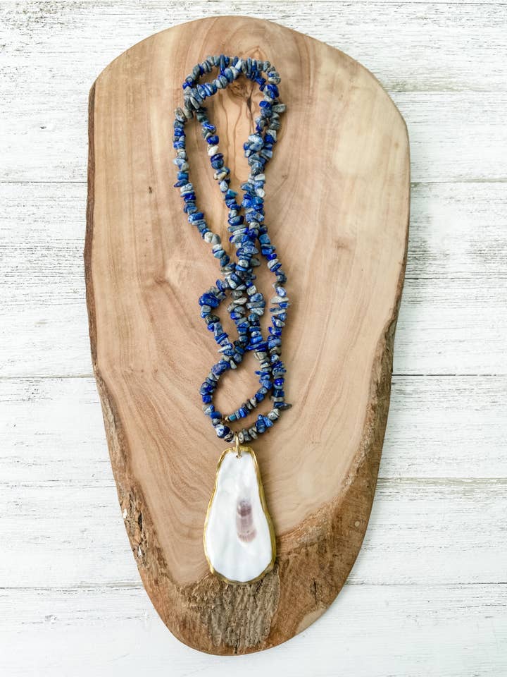 The Sophie Necklace - Blue Lapis with Oyster Shell Pendant for wholesale by Made on Maidstone