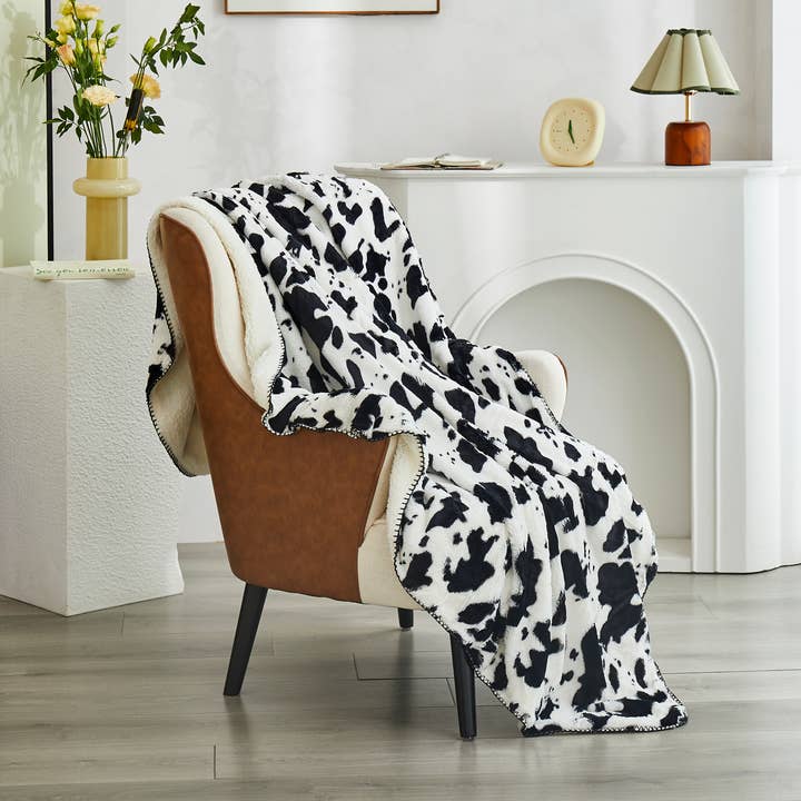 "Cow Skin" Faux Fur Plush Throw Blanket - 50"x70" for wholesale by Duke Imports