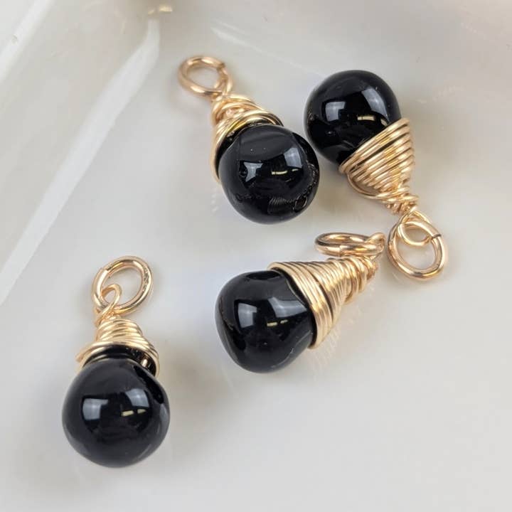 Freedom Midnight Black Charms in Gold - Pack of 4 for wholesale by Forai