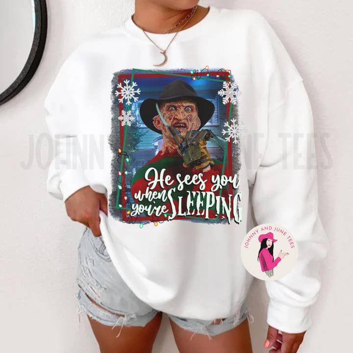 He Sees you When You're Sleeping Christmas Comfort Colors for wholesale by Johnny and June Tees