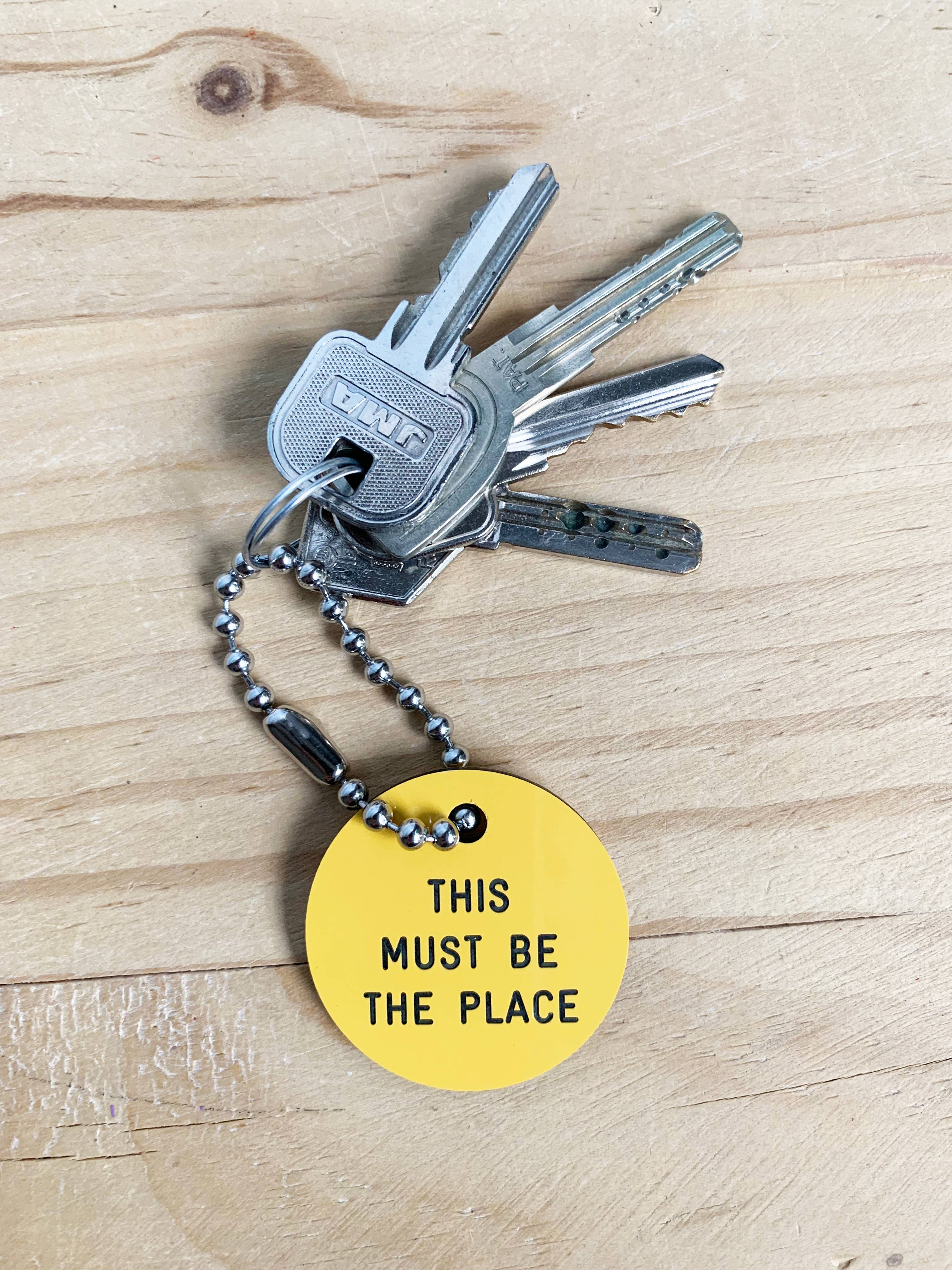 Diminuto Cielo – wholesale Nyckelring - Unisex – HAPPYKEYS: runda nyckelringar med valfri text0