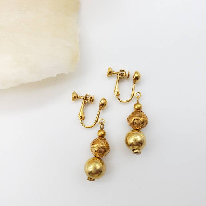 Gold Bead Clip Earrings for wholesale by Discoveries, Inc.