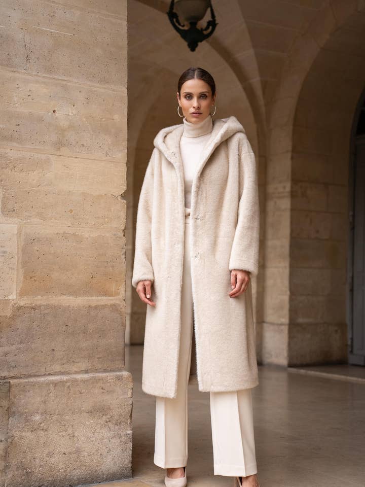 Long hooded synthetic fur coat for wholesale by Attentif Paris