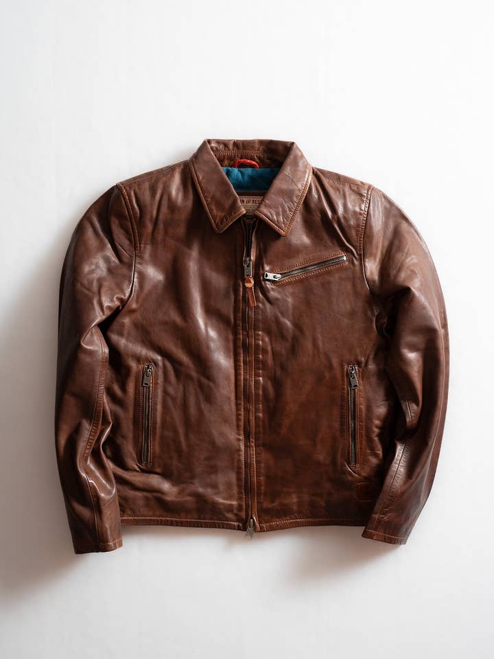 Gambler ko läderjacka för wholesale av Iron & Resin