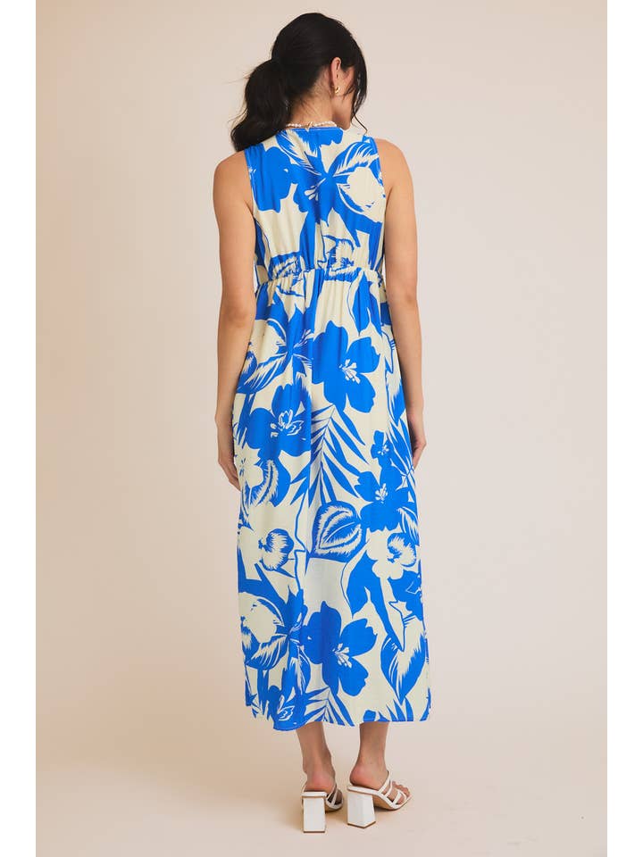 V-NECK FRONT TIE SLEEVELESS BUTTON UP TROPICAL PRINT DRESS for wholesale on Faire