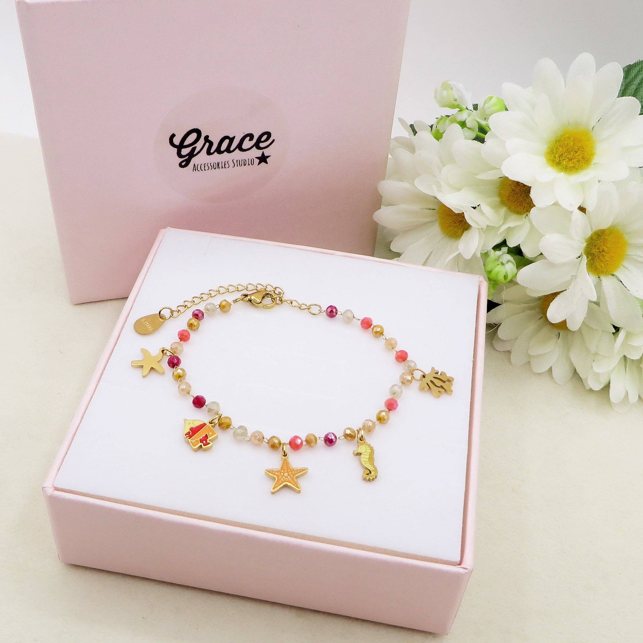 BIEGE COCCIO MAORI ~ Bracciale ACCIAIO INOSSIDABILE con cristalli e ciondoli marini for wholesale on Faire1