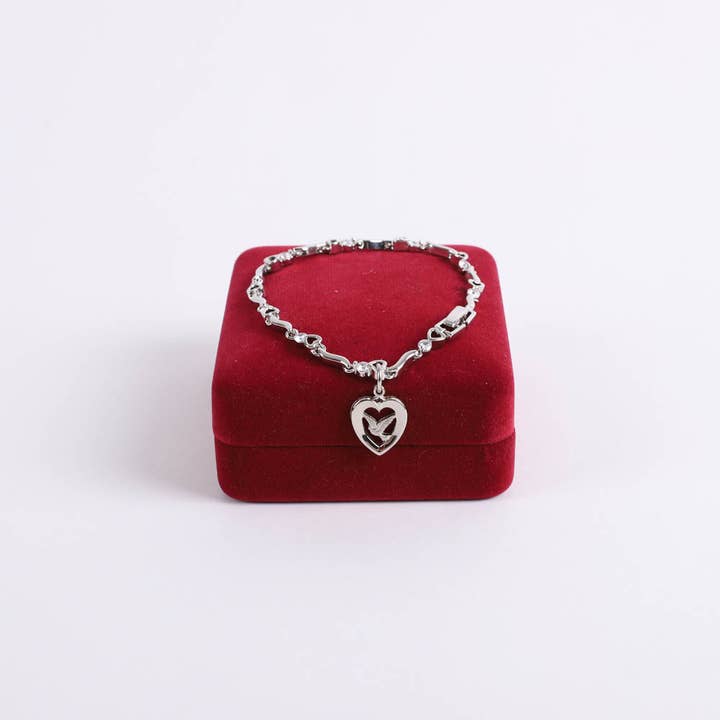Bracelet - Rhodium and Cubic Zirconia with Heart/Dove Charm for wholesale by Swanson Christian Products