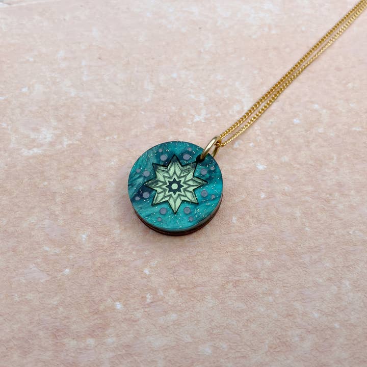 Celestial Disc Pendant: Teal Glitter for wholesale by Rosa Pietsch