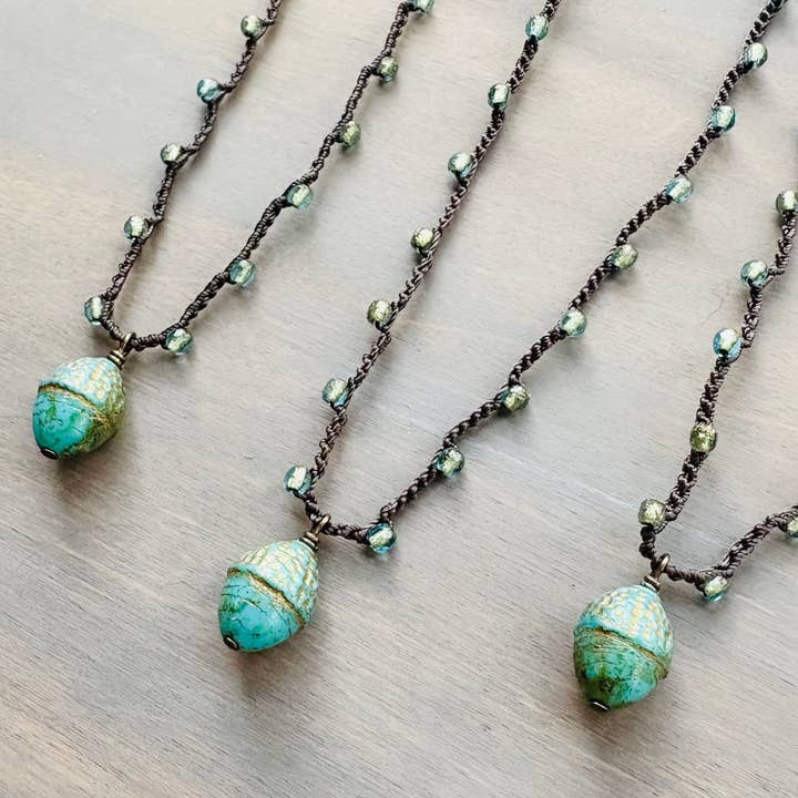 Twist Style - Wholesale Pendant/Charm Necklace - Antique Acorn Drop Crocheted Necklace With Green Crystals