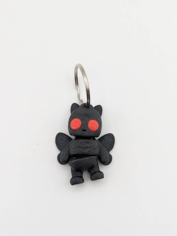 3D printed Mothman Keychain for wholesale by The Midnight Oil