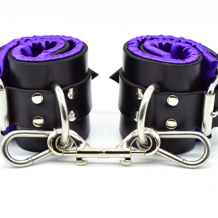 Purple Satin Lined Leather Ankle Bondage Cuffs for wholesale by Axovus