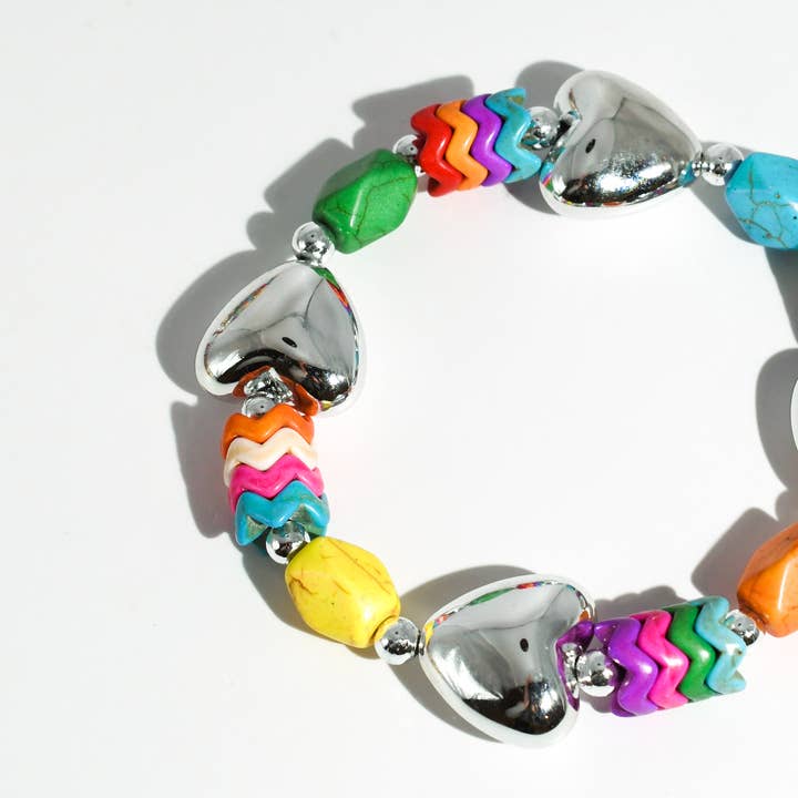 Bracelet Cœur Pop Argent pour la vente par Treasure Jewels Inc.