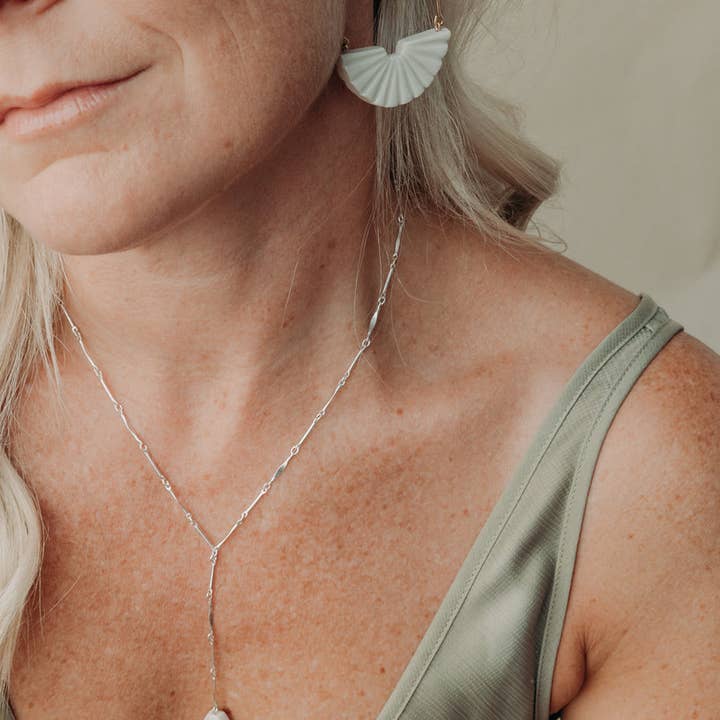 White Sun Ray Earrings for wholesale on Faire4