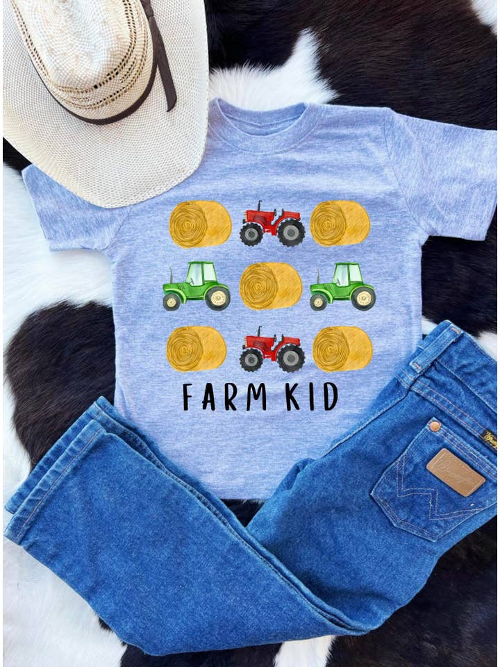 Grey Farm kid tractors and hay for wholesale on Faire