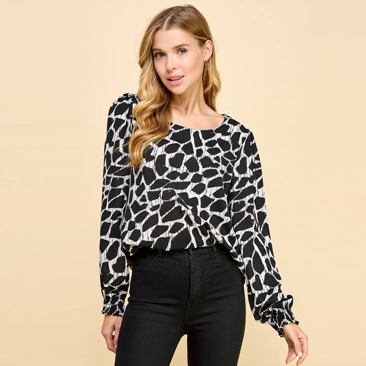 Black Abstract Print top with Smocked Sleeves for wholesale on Faire