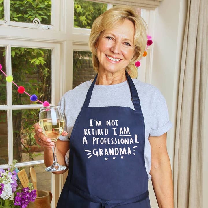 'I Am Not Retired, I Am A Professional Grandma' Apron for wholesale by Ellie Ellie LTD