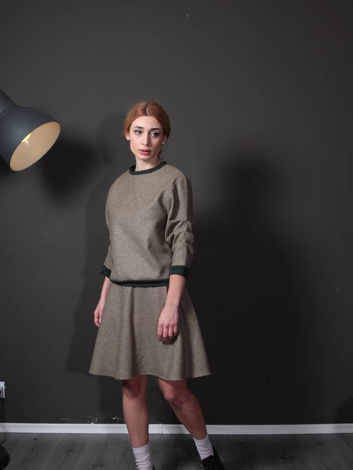 Pullover in lana con maniche a sbuffo per la vendita all'ingrosso da parte di Unatura